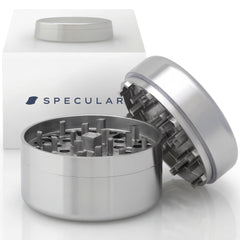 OG1 304 stainless steel grinder, closed, beside its gift box